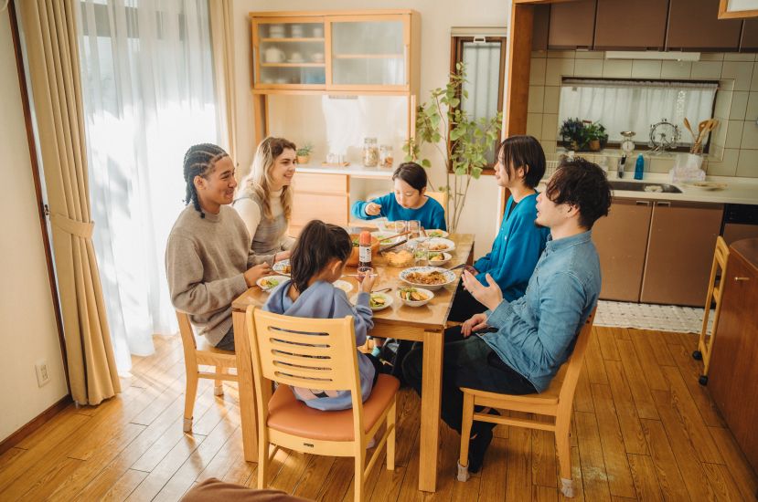 A family sharing a home-cooked meal with guests